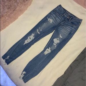 High-Rise Ripped Jeans